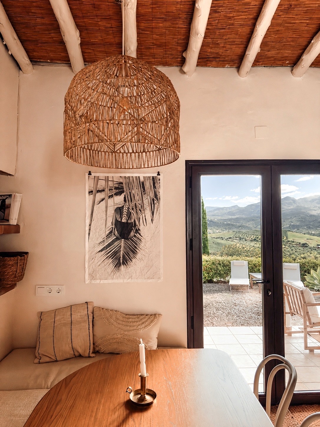 Andalucian living room with wooden beams and terracotta floor